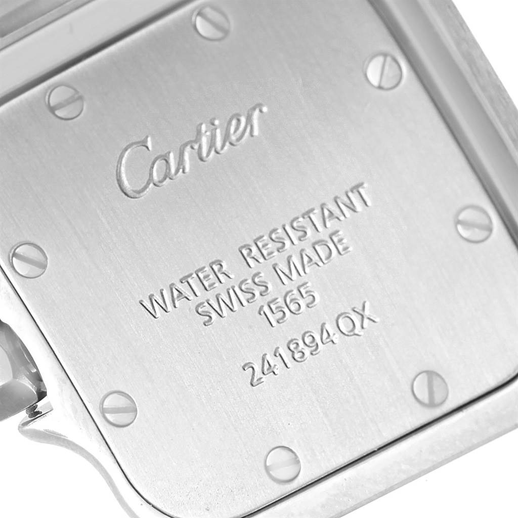 This image shows a close-up of the back case of a Cartier Santos W20056D6 Men's Stainless Steel Silver Dial W20056D6 Men's Stainless Steel Silver Dial watch, highlighting its water resistance and Swiss-made details.