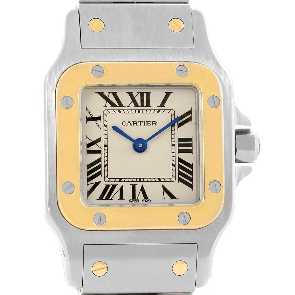 The image shows a front view of the Cartier Santos W20012C4 Women's Stainless Steel Silver Dial W20012C4 Women's Stainless Steel Silver Dial watch, featuring its square face, Roman numerals, and metal bracelet.