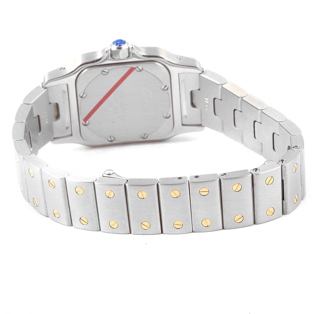 The image shows the back and bracelet of a Cartier Santos W20012C4 Women's Stainless Steel Silver Dial W20012C4 Women's Stainless Steel Silver Dial watch, highlighting its metal links with gold screw accents.