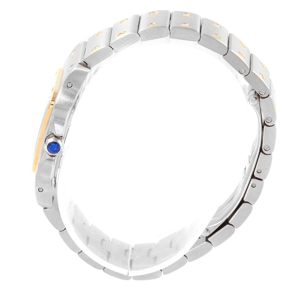 The image shows a Cartier Santos W20012C4 Women's Stainless Steel Silver Dial W20012C4 Women's Stainless Steel Silver Dial watch from a side profile, highlighting its metal bracelet and crown with a blue cabochon.