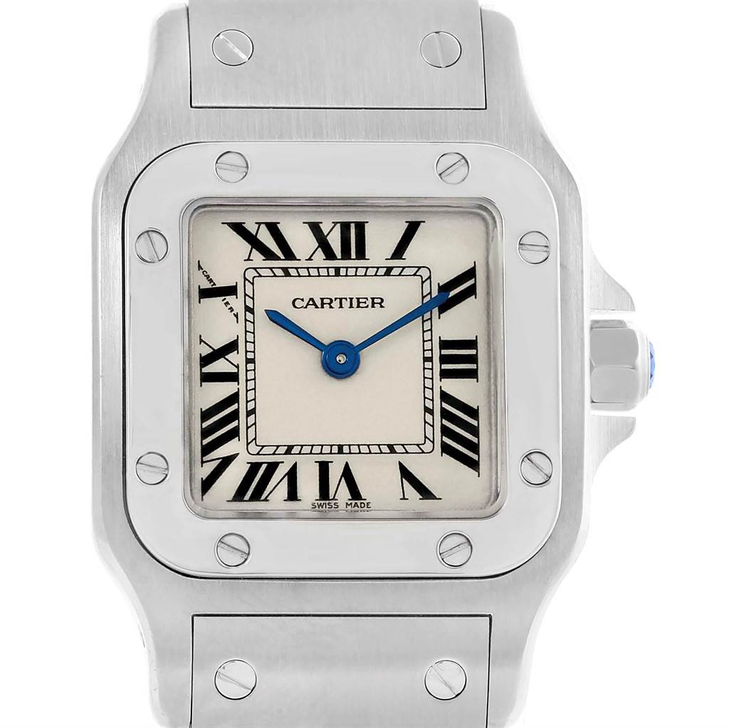The image shows a front view of the Cartier Santos W20056D6 Women's Stainless Steel Silver Dial W20056D6 Women's Stainless Steel Silver Dial watch, highlighting the face, bezel, and part of the bracelet.