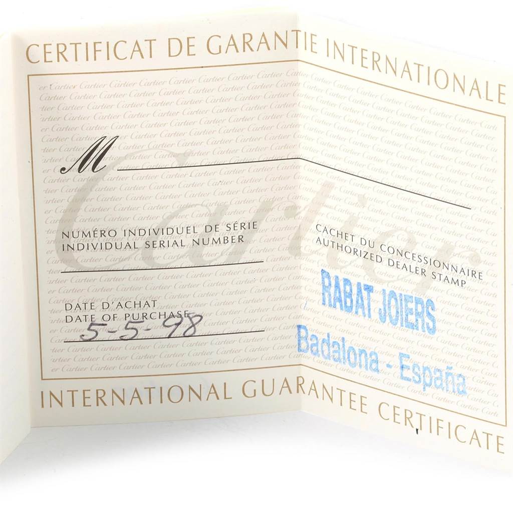The image shows the international guarantee certificate for a Santos model by Cartier, folded open and displaying ownership details.