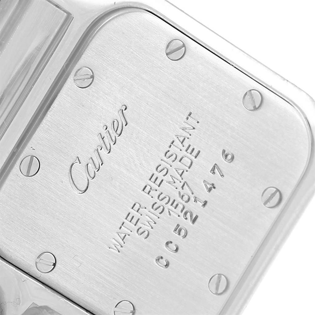 This image shows the back case of a Cartier Santos 1567 Women's Stainless Steel Silver Dial 1567 Women's Stainless Steel Silver Dial watch, highlighting the brand logo and model specifications.