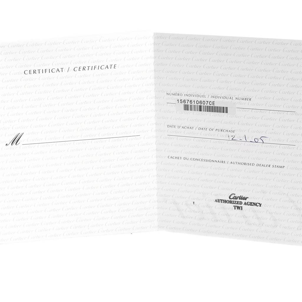 This image shows the open certificate booklet for the Santos model by Cartier, displaying individual number and date of purchase.