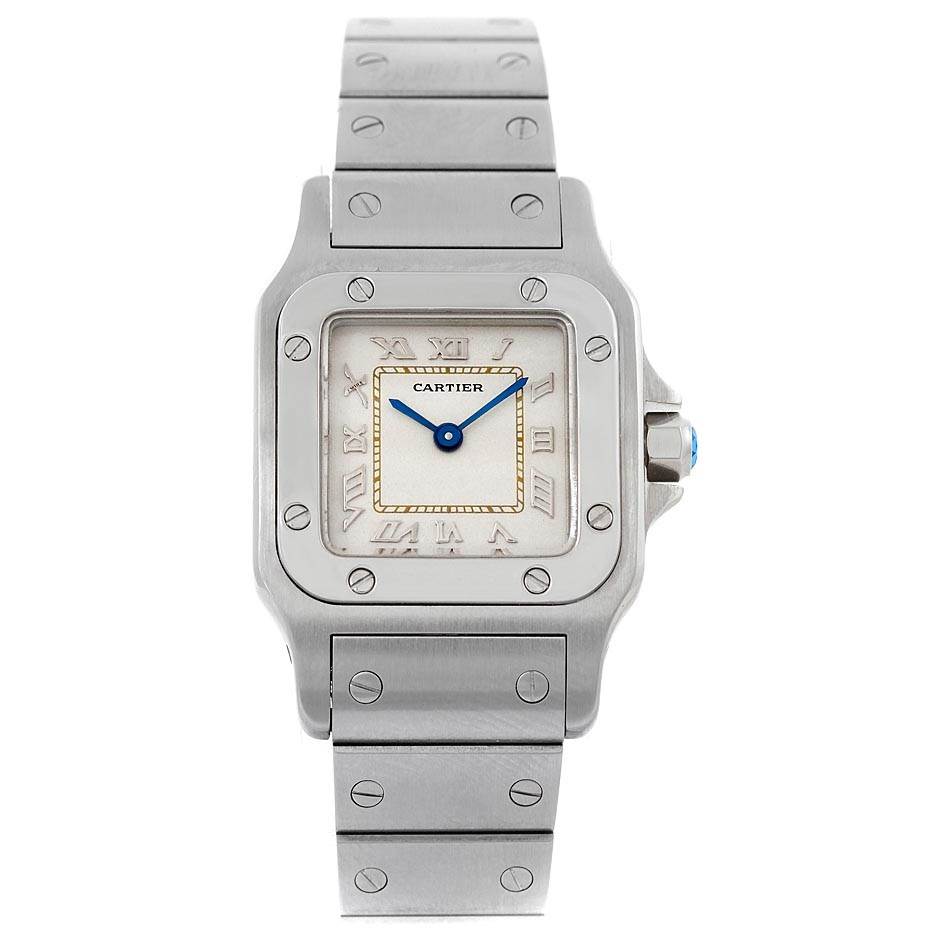The image shows a front view of the Santos model watch by Cartier, highlighting the face, bezel, and bracelet.