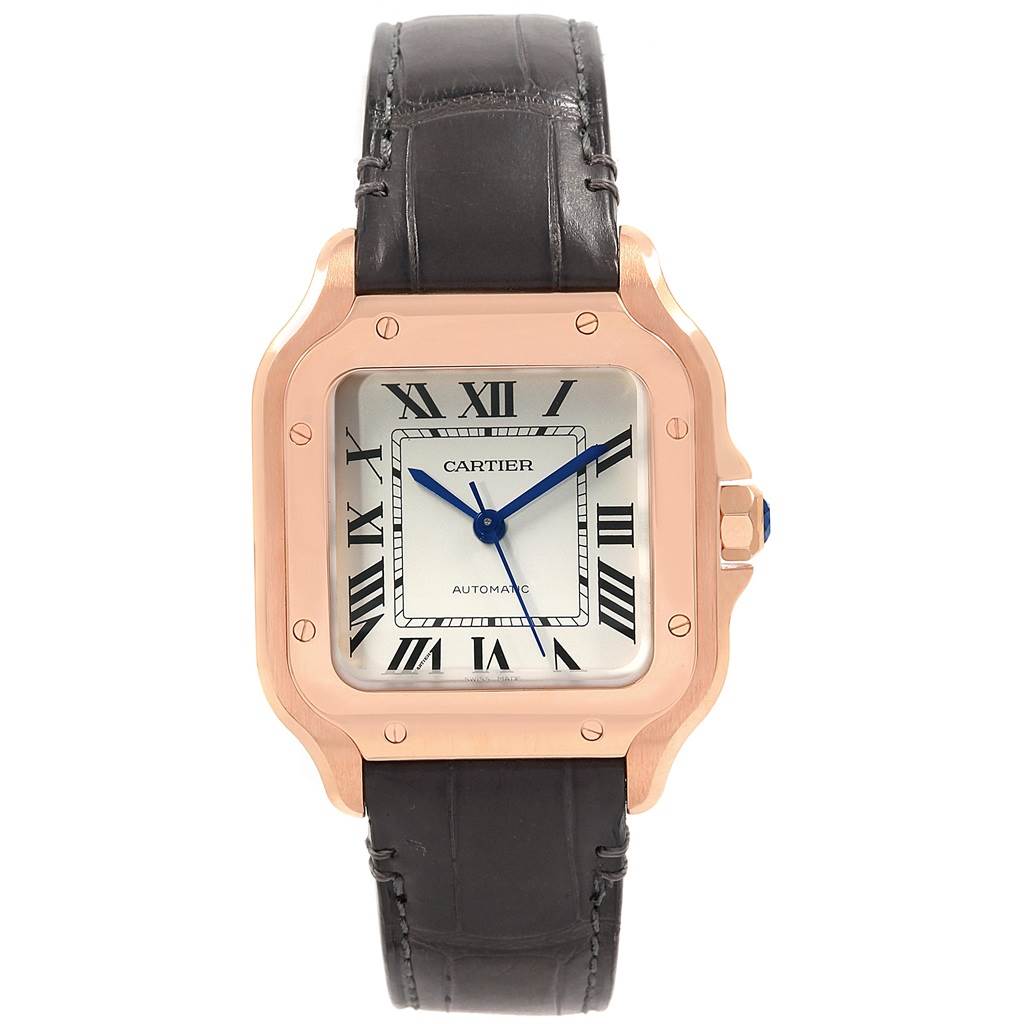 The image shows a front view of a Cartier Santos WGSA0012 Women's Rose Gold Silver Dial WGSA0012 Women's Rose Gold Silver Dial watch, highlighting its square face, Roman numerals, and leather strap.