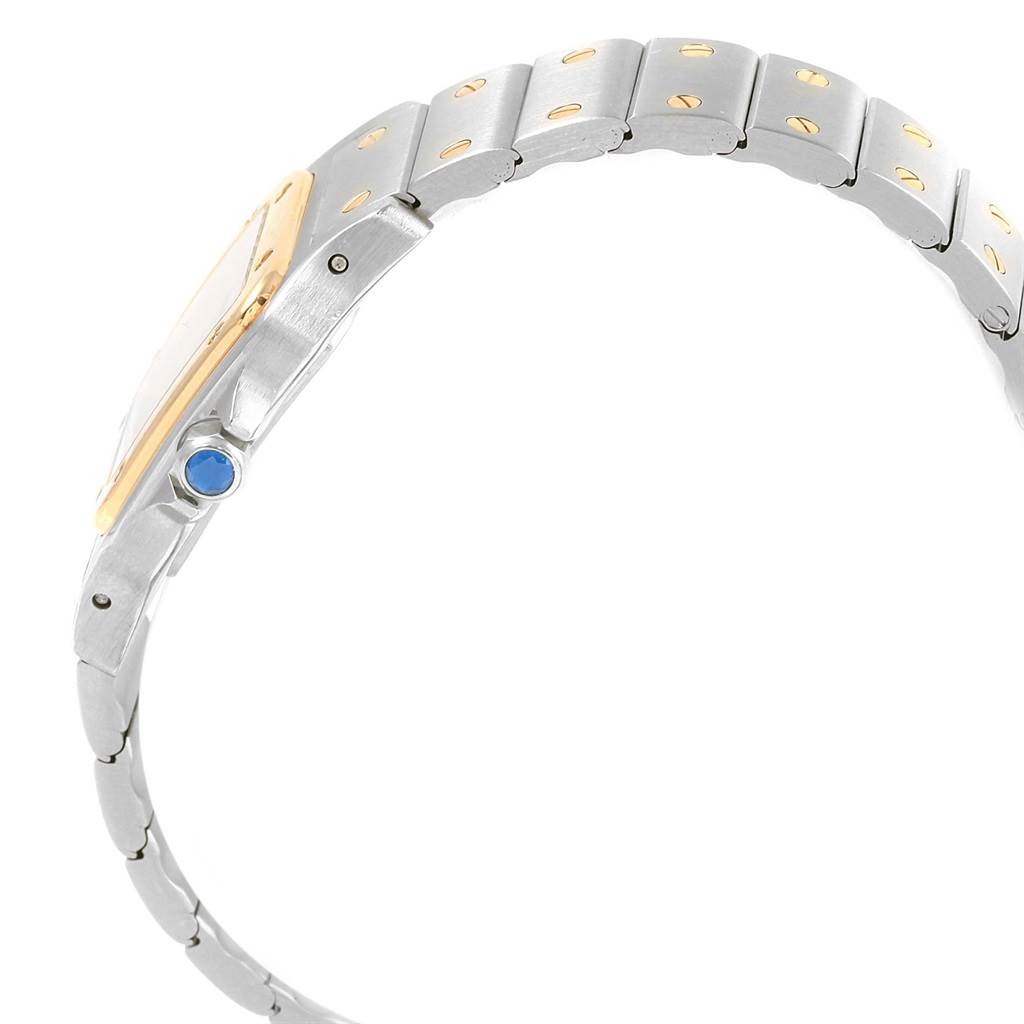 This image shows a side angle view of the bracelet and crown of a Cartier Santos 1057930 Women's Stainless Steel Silver Dial 1057930 Women's Stainless Steel Silver Dial model watch.