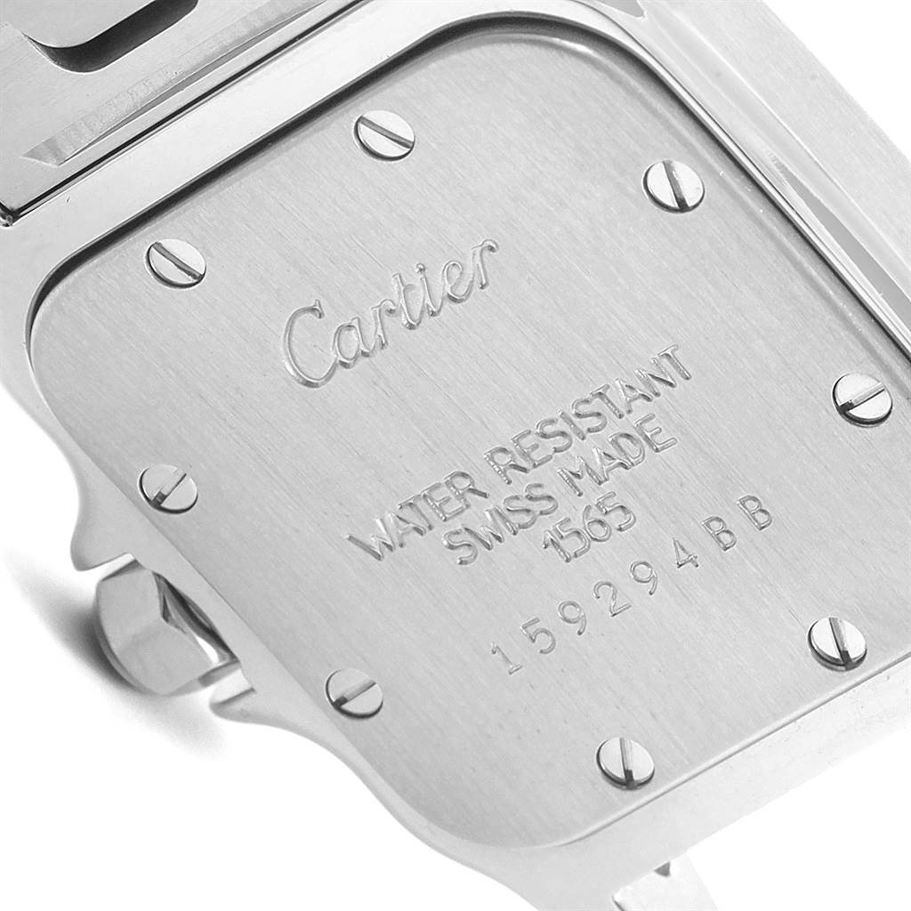 This image shows the case back of a Cartier Santos 1565 Women's Stainless Steel Silver Dial 1565 Women's Stainless Steel Silver Dial watch at a close-up angle.