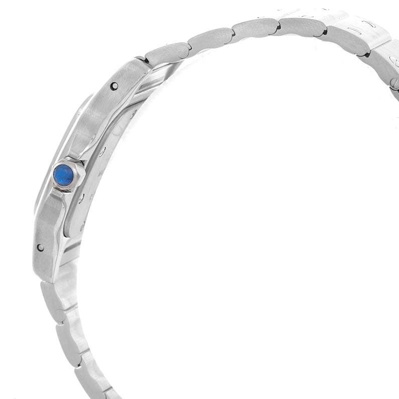 The image shows a side view of a Santos model watch by Cartier, highlighting the case and part of the metal bracelet.