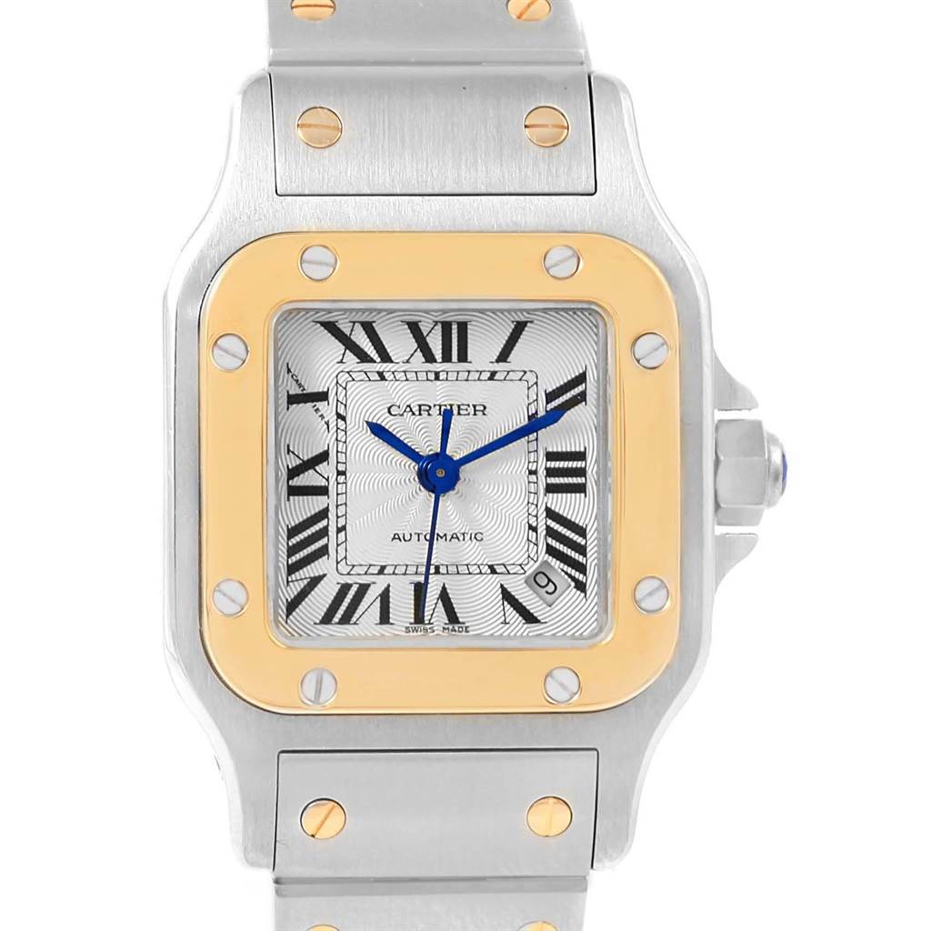 The image shows a front view of a Cartier Santos W20057C4 Women's Stainless Steel Silver Dial W20057C4 Women's Stainless Steel Silver Dial watch, highlighting its face, bezel, and part of the strap.