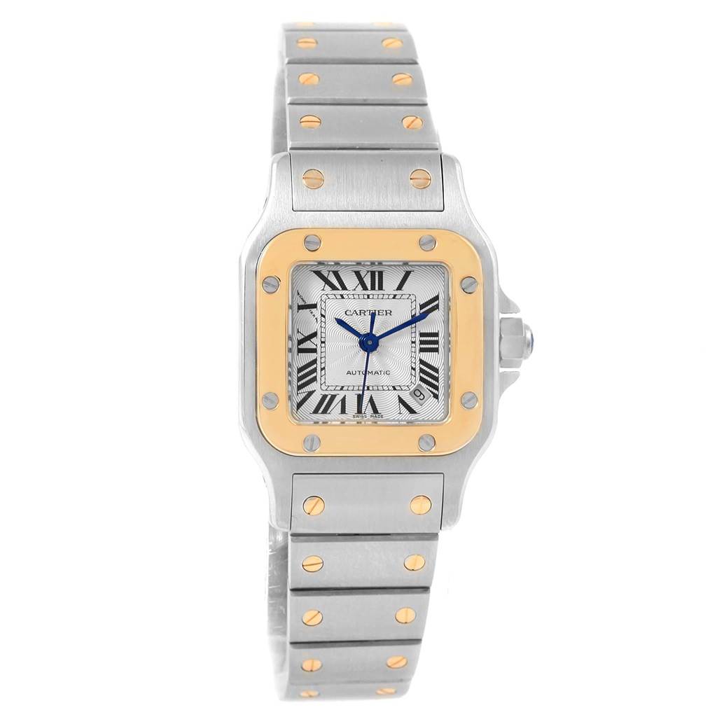 The image shows a front view of the Cartier Santos W20057C4 Women's Stainless Steel Silver Dial W20057C4 Women's Stainless Steel Silver Dial watch, highlighting its square face, gold bezel, and stainless steel bracelet.