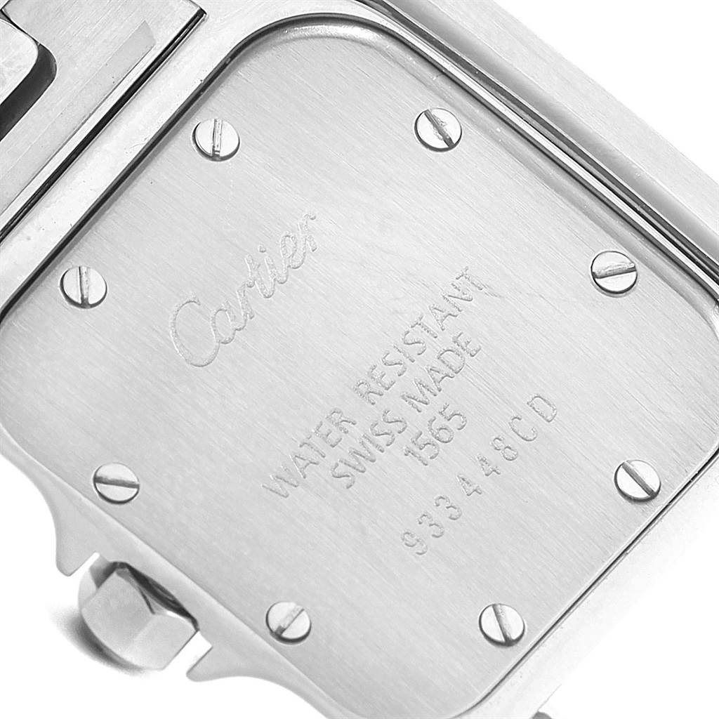 The image shows the back of a Cartier Santos W20056D6 Women's Stainless Steel Silver Dial W20056D6 Women's Stainless Steel Silver Dial watch, highlighting the engraved details and screws.