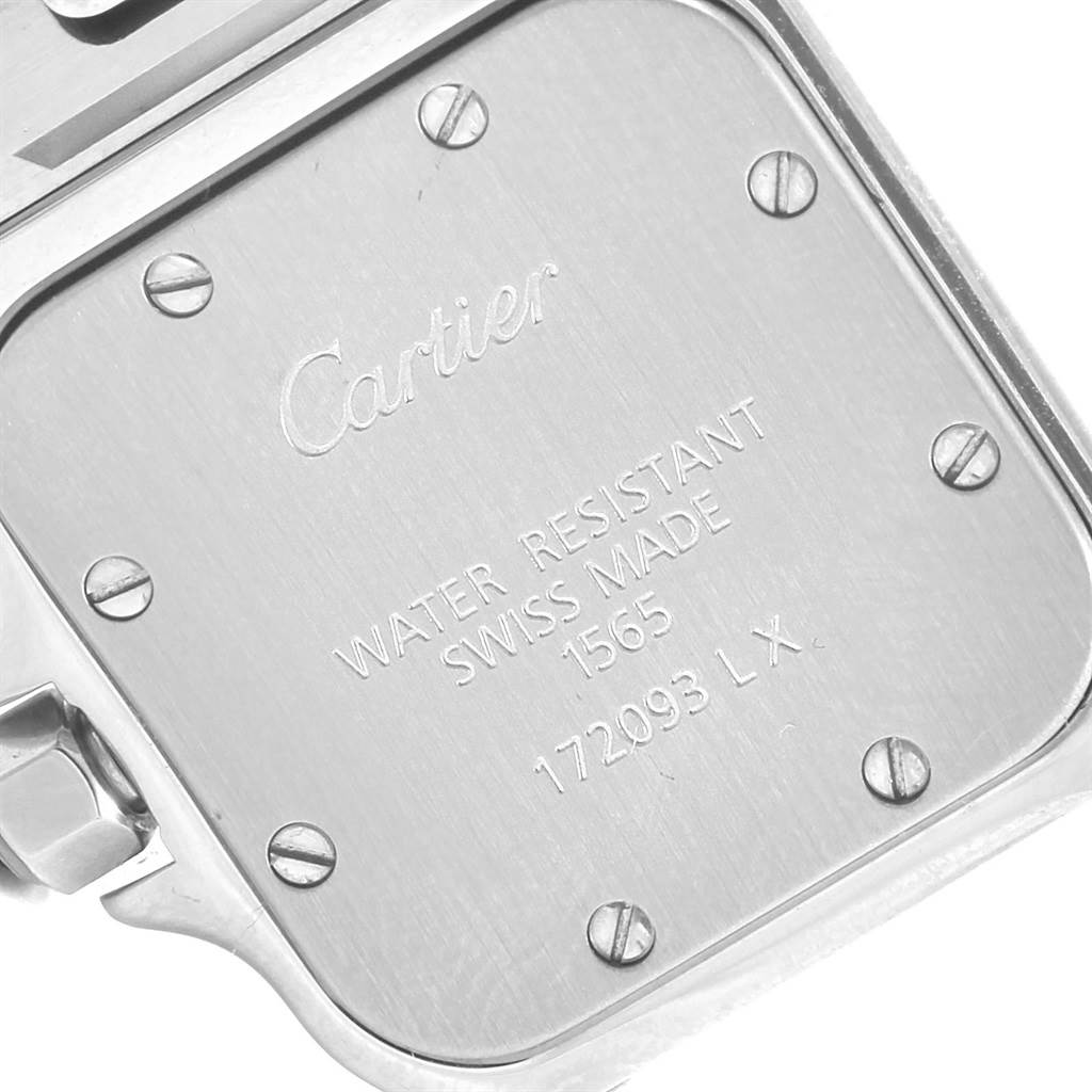 This image shows a close-up of the case back and part of the crown of a Cartier Santos W20056D6 Women's Stainless Steel Silver Dial W20056D6 Women's Stainless Steel Silver Dial model watch.