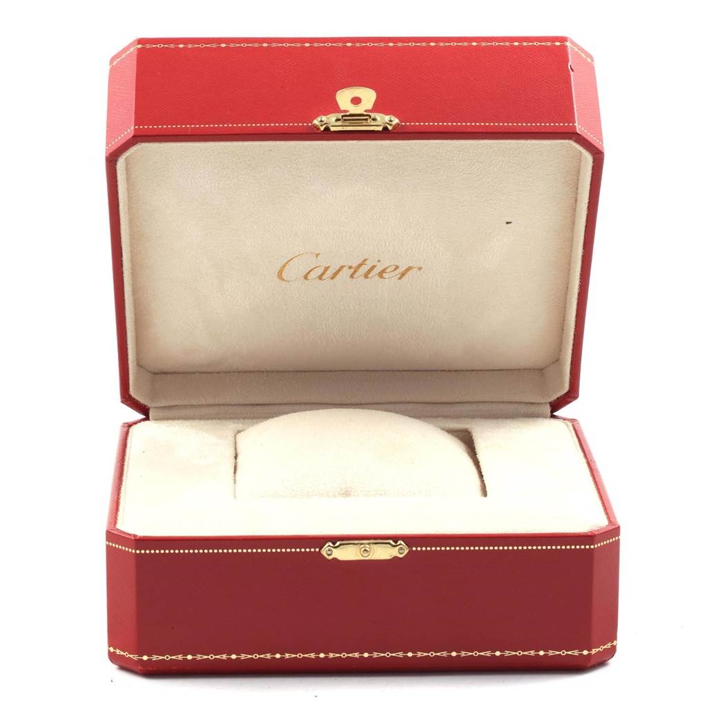 The image shows a red Cartier box for the Santos model, featuring the open case with a white cushion inside.