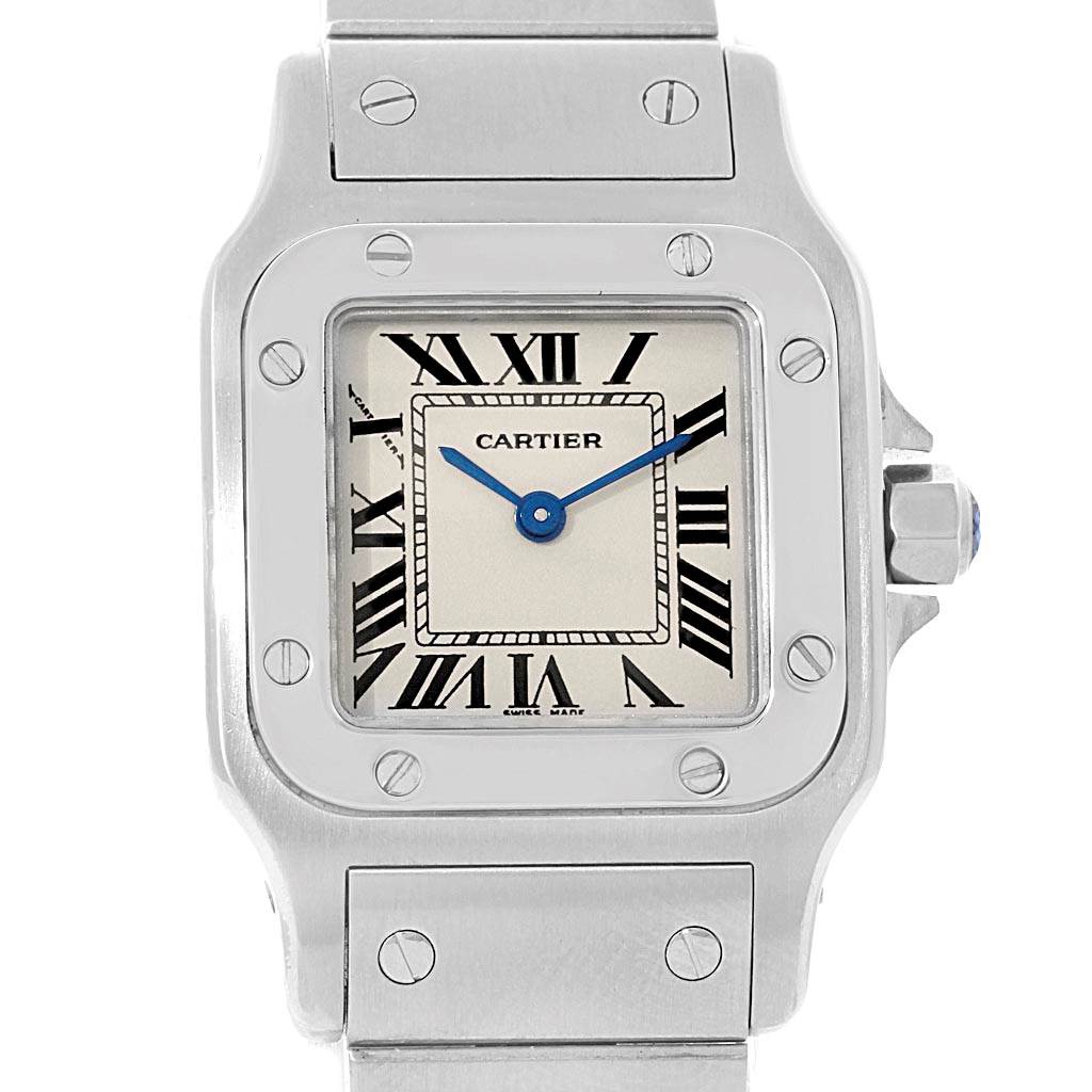 This image shows a front view of the Cartier Santos W20056D6 Women's Stainless Steel Silver Dial W20056D6 Women's Stainless Steel Silver Dial watch, focusing on the dial, bezel, and part of the bracelet.