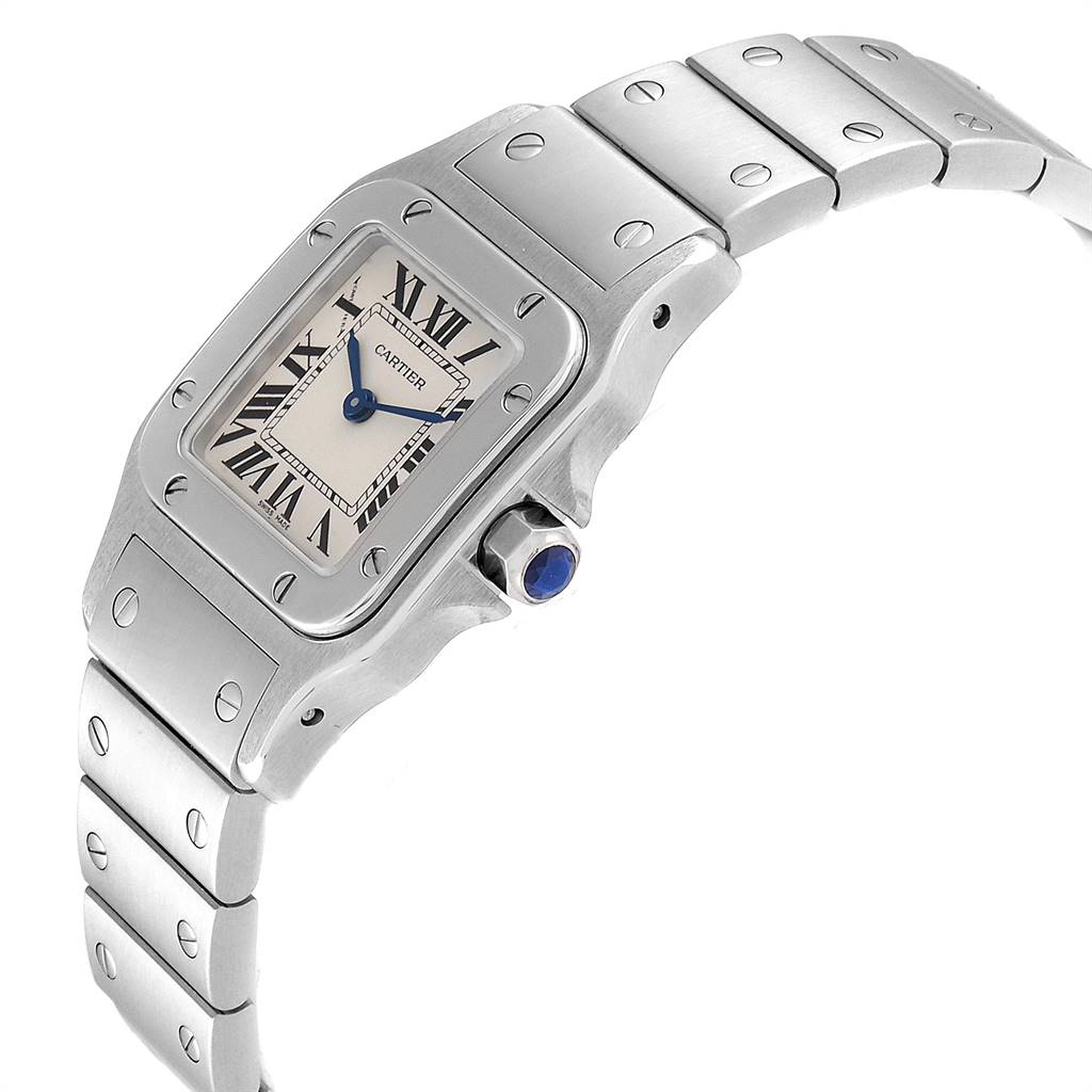 The image shows a side-angle view of a Cartier Santos W20056D6 Women's Stainless Steel Silver Dial W20056D6 Women's Stainless Steel Silver Dial watch, highlighting the watch face, bracelet, and crown.