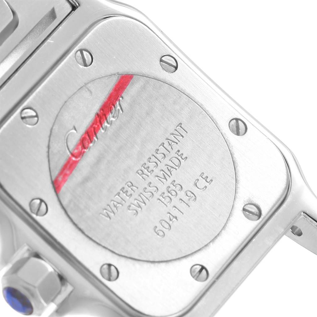 This image shows the back case and winding crown of a Cartier Santos W20056D6 Women's Stainless Steel Silver Dial W20056D6 Women's Stainless Steel Silver Dial watch at a slight angle.