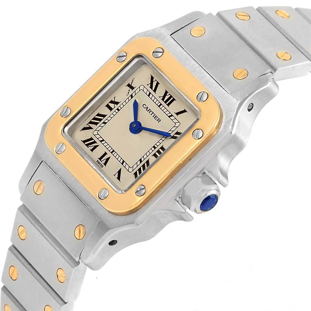 This Cartier Santos 1057930 Women's Stainless Steel Silver Dial 1057930 Women's Stainless Steel Silver Dial watch is viewed at a slight angle, showing the face, bezel, and part of the metal bracelet.