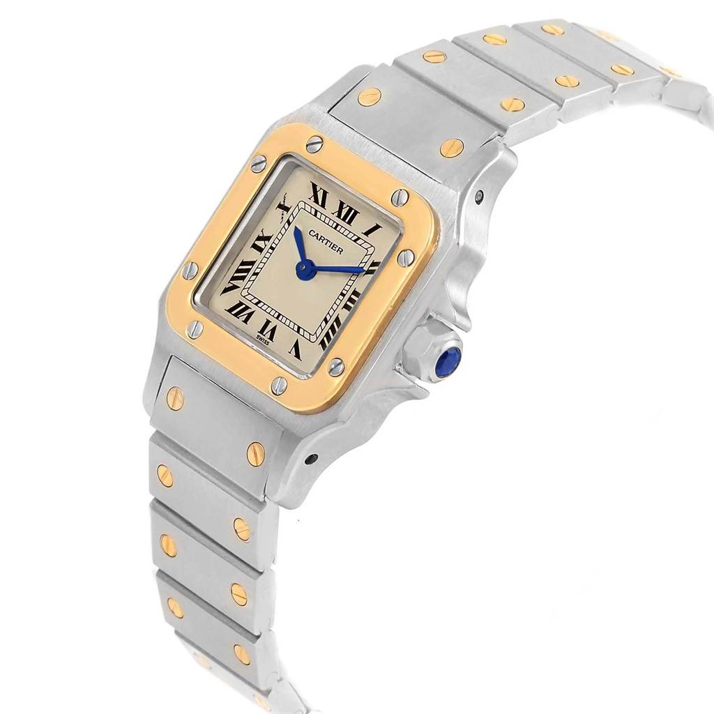 The image shows a Cartier Santos 1057930 Women's Stainless Steel Silver Dial 1057930 Women's Stainless Steel Silver Dial watch from a top angle, highlighting its square face, two-tone bezel, and bracelet.