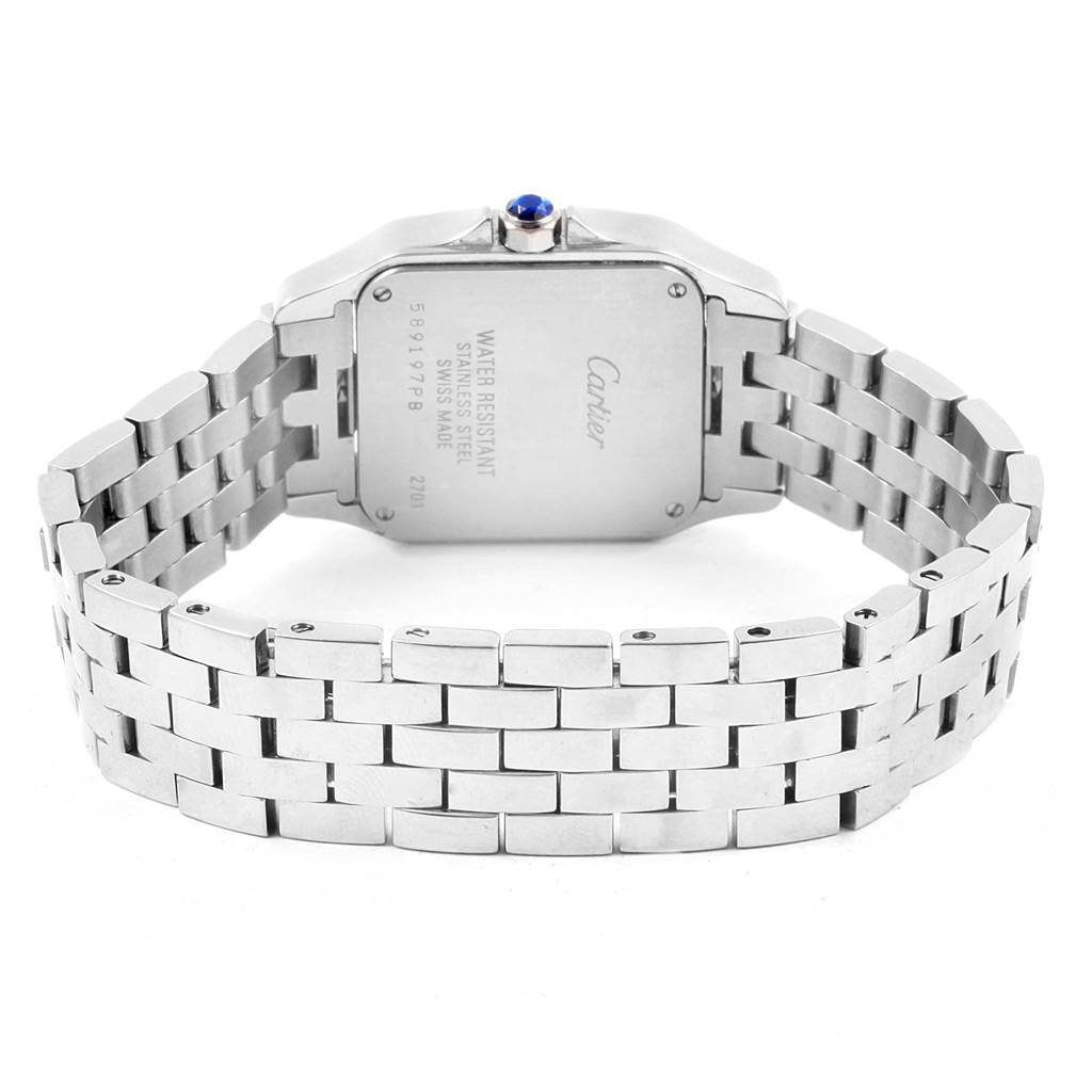 The image shows the Santos model by Cartier from the back, displaying the case back and stainless steel bracelet.
