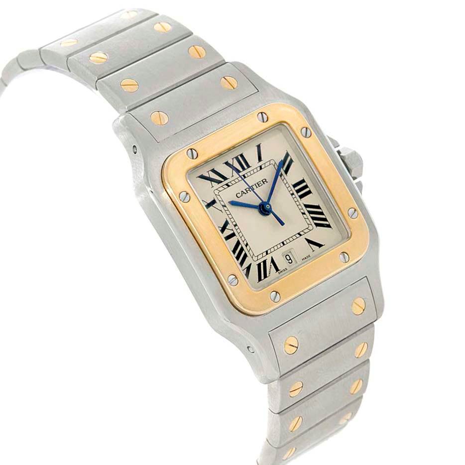 The image shows a Cartier Santos W20011C4 Stainless Steel Silver Dial W20011C4 Stainless Steel Silver Dial model watch from a tilted angle, highlighting the face, bezel, and part of the bracelet.