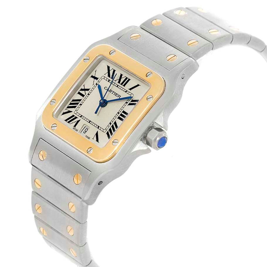 The image shows a Santos model by Cartier from an angled view highlighting the face, bezel, and part of the bracelet.