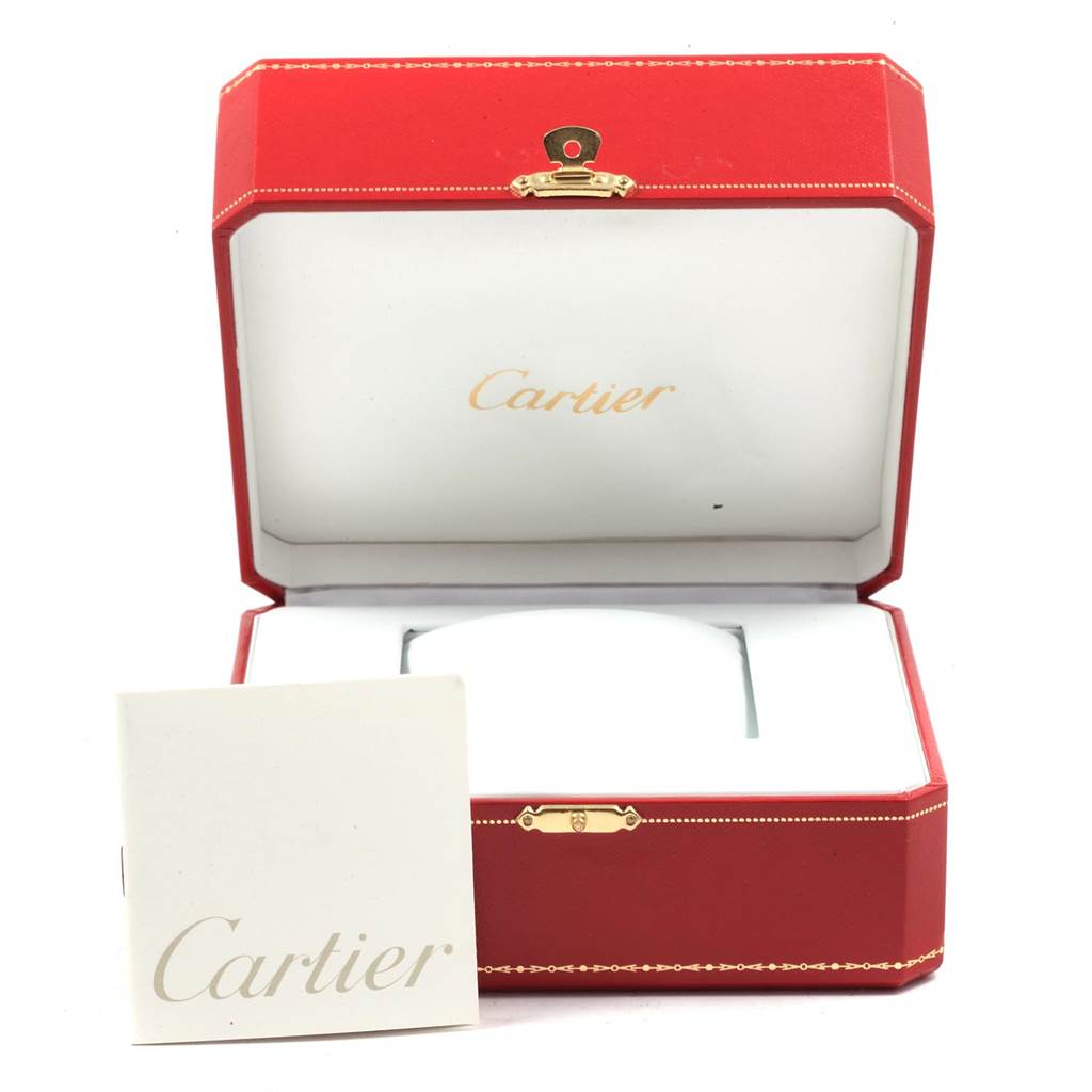 This image shows an open red presentation box and booklet for the Cartier Santos W20011C4 Stainless Steel Silver Dial W20011C4 Stainless Steel Silver Dial watch model from a front angle.