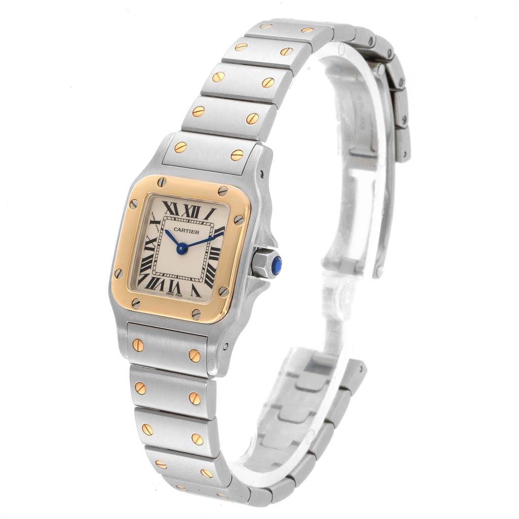 This image shows a side view of the Cartier Santos W20012C4 Women's Stainless Steel Silver Dial W20012C4 Women's Stainless Steel Silver Dial watch, highlighting the dial, bezel, and part of the bracelet.