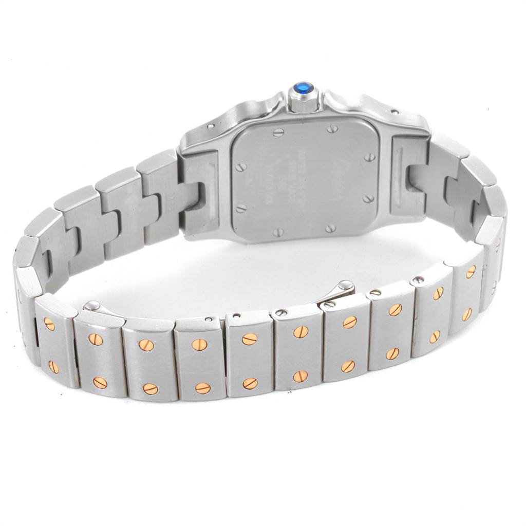 This image shows the back and bracelet of a Santos model watch by Cartier.
