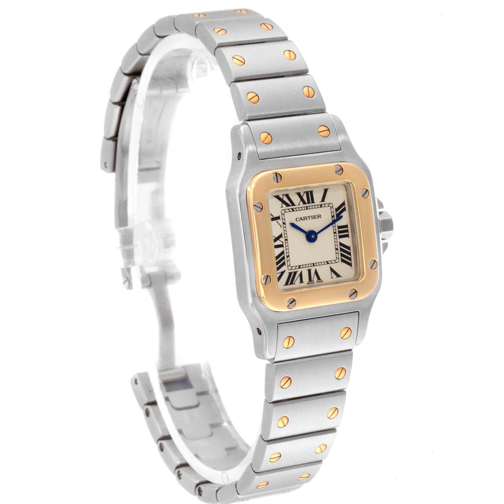The image shows a side angle of a Cartier Santos W20012C4 Women's Stainless Steel Silver Dial W20012C4 Women's Stainless Steel Silver Dial watch, highlighting its square face, Roman numeral dial, and metal bracelet with gold screws.