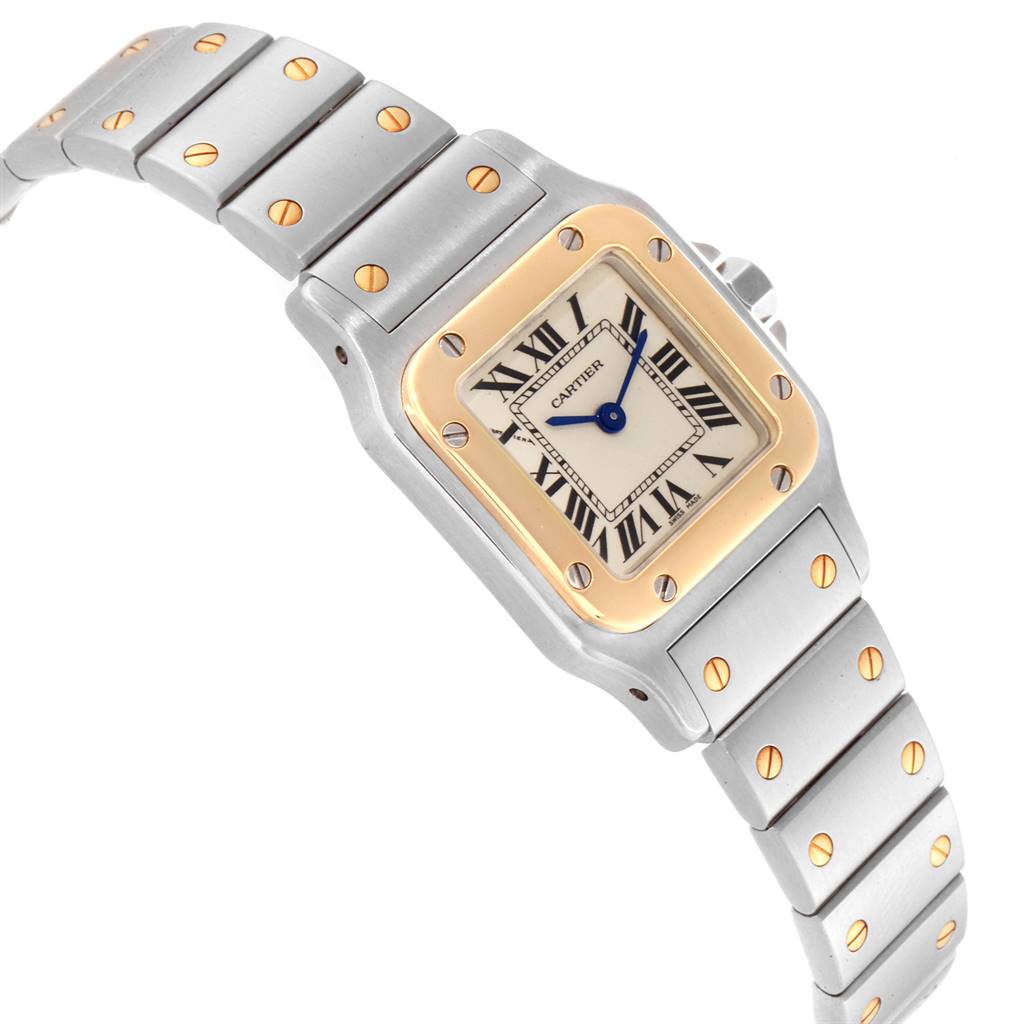The Santos model by Cartier is shown at an angle highlighting the face, bezel, and part of the bracelet.