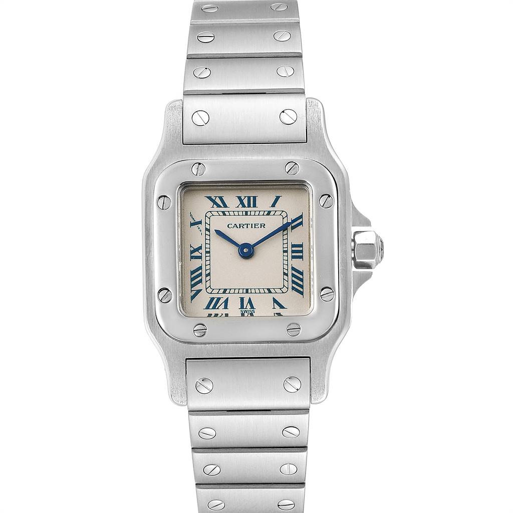 The image shows a front view of a Cartier Santos 1565 Women's Stainless Steel Silver Dial 1565 Women's Stainless Steel Silver Dial model watch, featuring a square face, Roman numeral dial, and a metal bracelet.