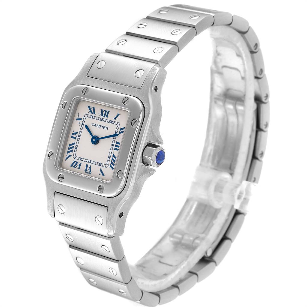 The Cartier Santos 1565 Women's Stainless Steel Silver Dial 1565 Women's Stainless Steel Silver Dial watch is shown at a three-quarter angle, displaying its face, bezel, and part of the bracelet.