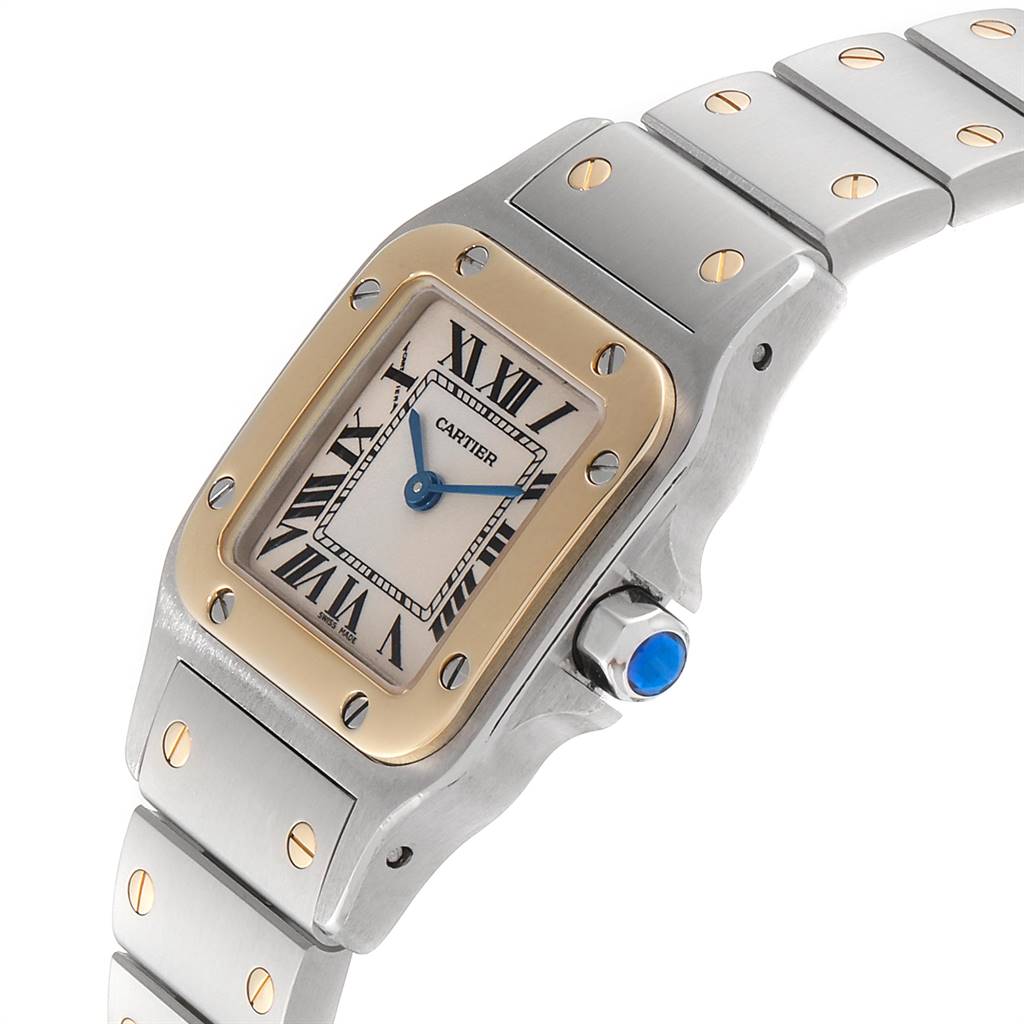 This Cartier Santos W20012C4 Stainless Steel Silver Dial W20012C4 Stainless Steel Silver Dial watch is shown from an angled view, highlighting the dial, bezel, and part of the bracelet.