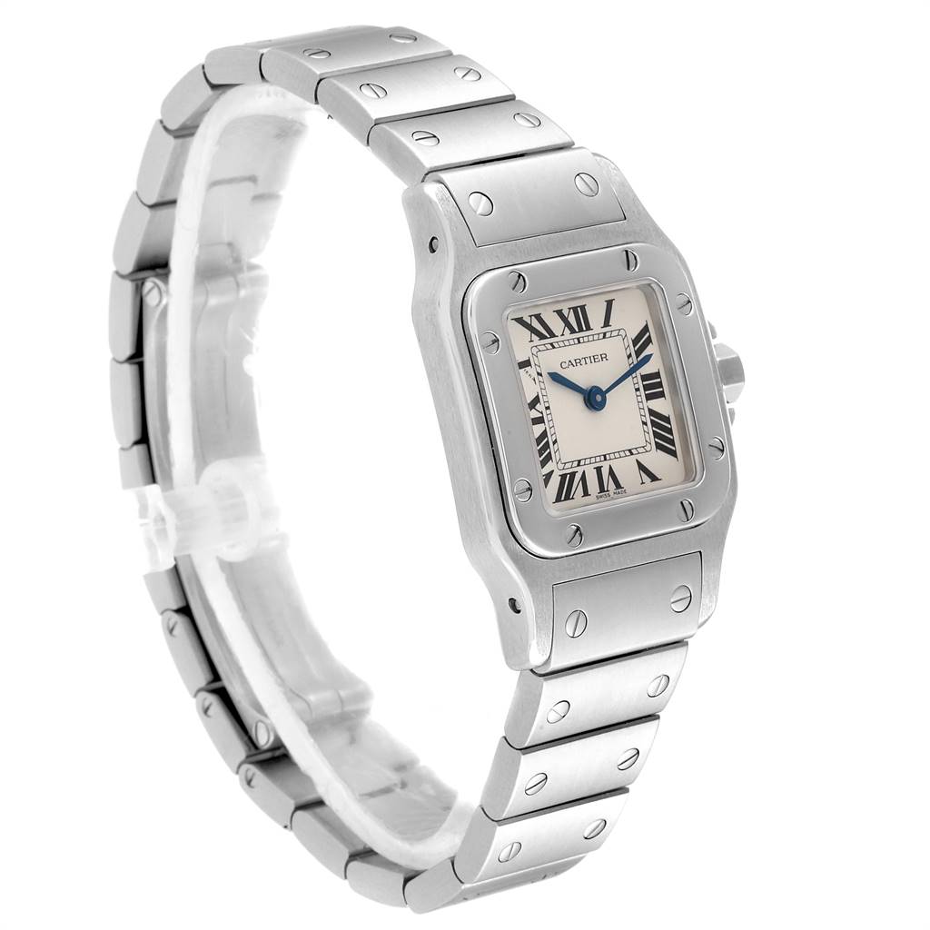 The image shows a Santos model Cartier watch at a three-quarter angle, highlighting its face, bracelet, and crown.