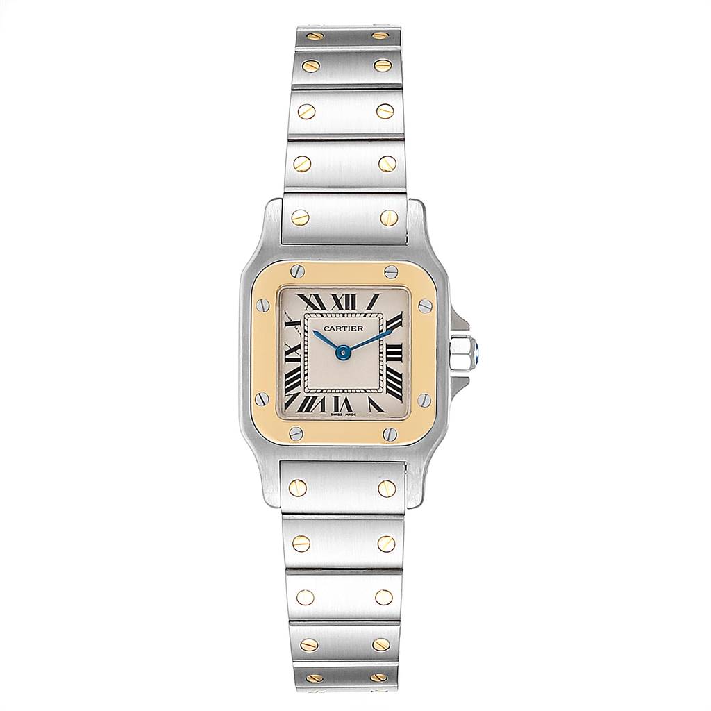 The image shows a frontal view of the Cartier Santos W20012C4 Women's Stainless Steel Silver Dial W20012C4 Women's Stainless Steel Silver Dial watch displaying its face, bezel, and metal strap with gold screws.