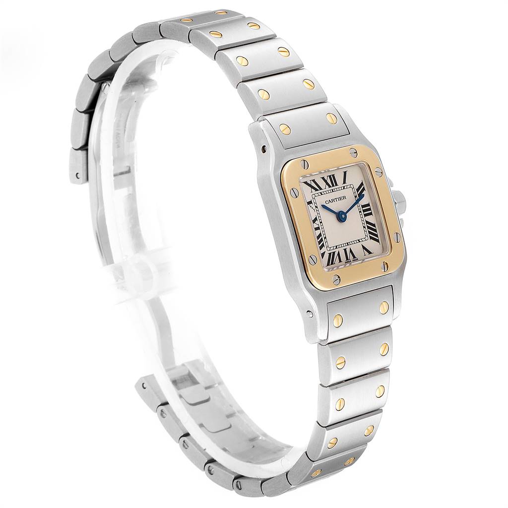 The image shows a Cartier Santos W20012C4 Women's Stainless Steel Silver Dial W20012C4 Women's Stainless Steel Silver Dial watch at an angled side view, displaying the face, bezel, and metal bracelet with gold screws.