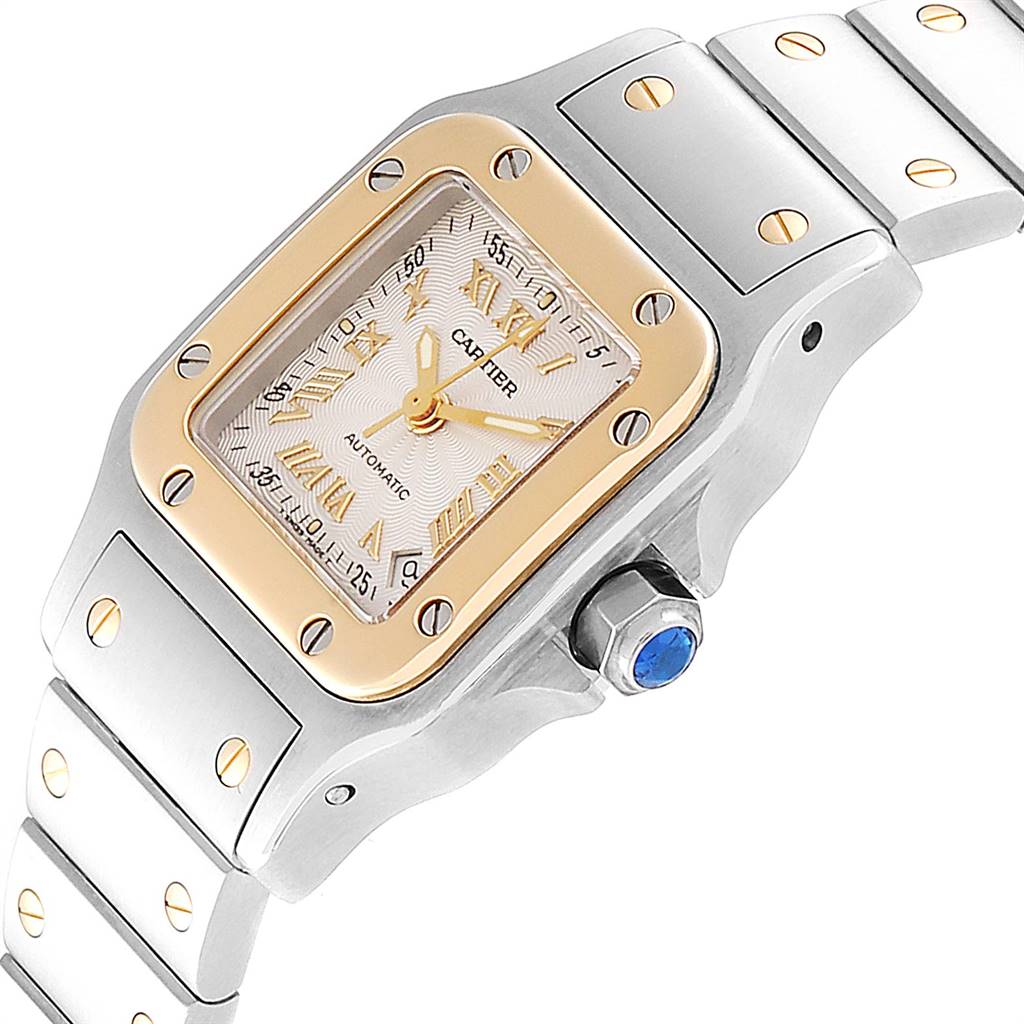 This image shows a close-up of the Cartier Santos W20057C4 Women's Stainless Steel Silver Dial W20057C4 Women's Stainless Steel Silver Dial watch, highlighting the dial, bezel, crown, and bracelet links.