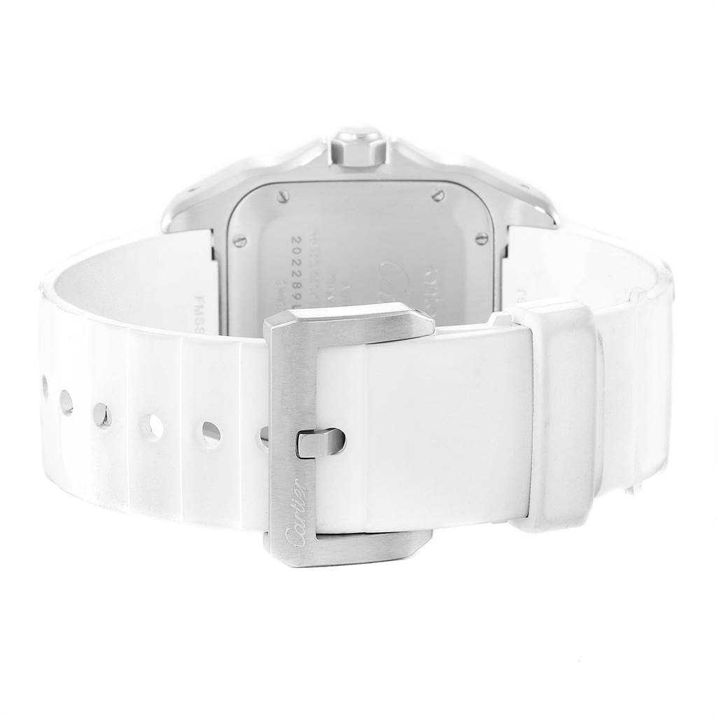 The image shows the back view of a Cartier Santos W20129U2 Women's Stainless Steel Silver Dial W20129U2 Women's Stainless Steel Silver Dial model watch with a white strap and a stainless steel clasp.