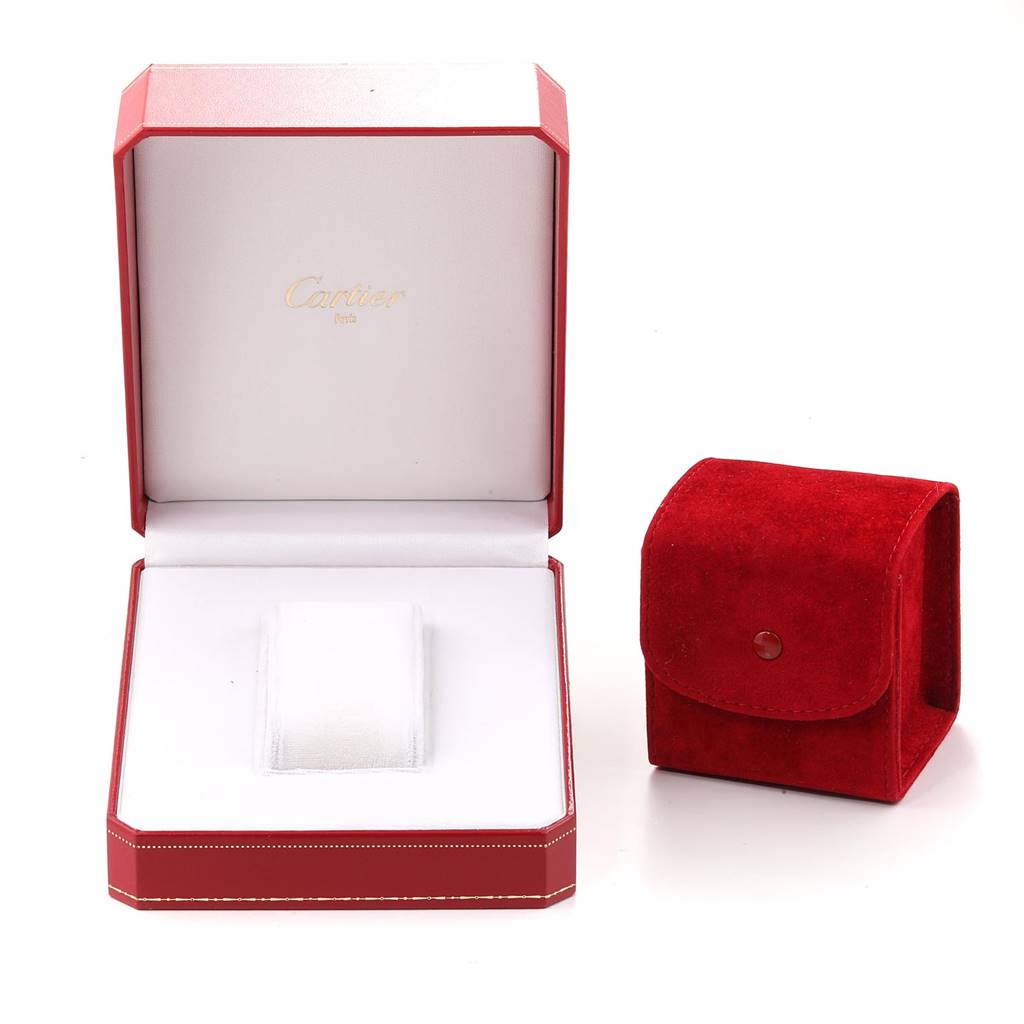 The image shows an open red Cartier watch box for the Santos model and a red suede travel pouch.