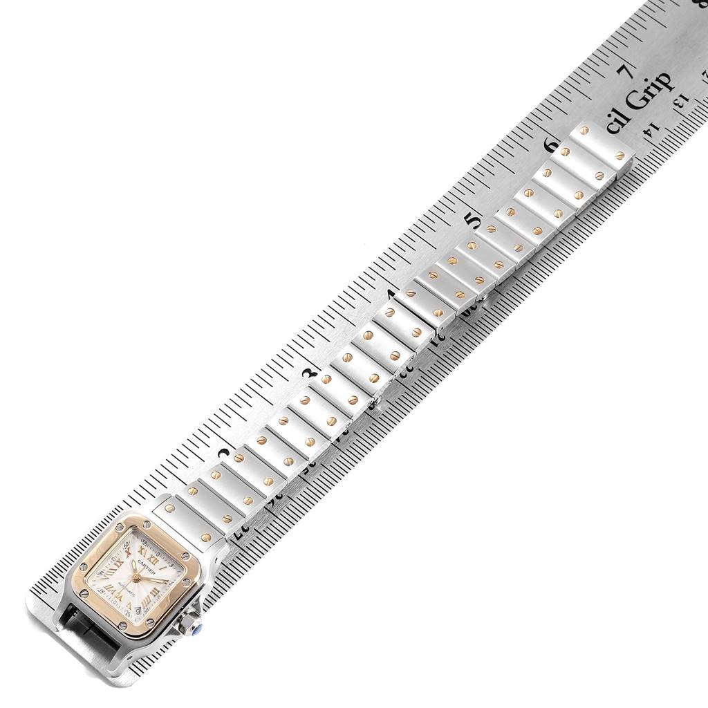 The image shows a Cartier Santos W20057C4 Women's Stainless Steel Silver Dial W20057C4 Women's Stainless Steel Silver Dial watch with a full view of its face and band measured against a metal ruler.