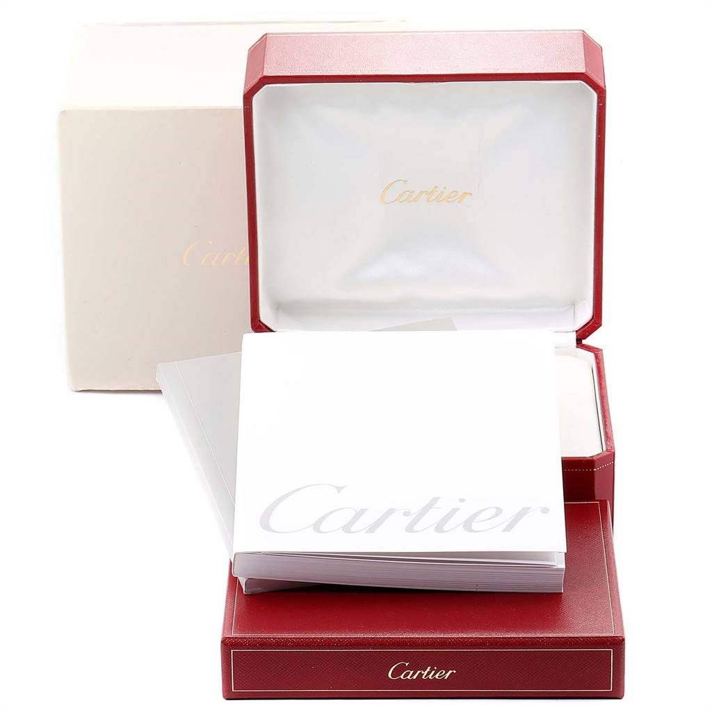 The image shows a Cartier Santos W20057C4 Women's Stainless Steel Silver Dial W20057C4 Women's Stainless Steel Silver Dial watch box, along with accompanying paperwork and outer packaging.