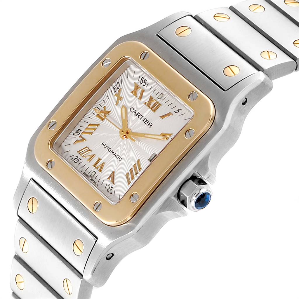 This image shows a close-up angle of the Cartier Santos W20058C4 Men's Stainless Steel Silver Dial W20058C4 Men's Stainless Steel Silver Dial watch, highlighting the face, bezel, and part of the bracelet.