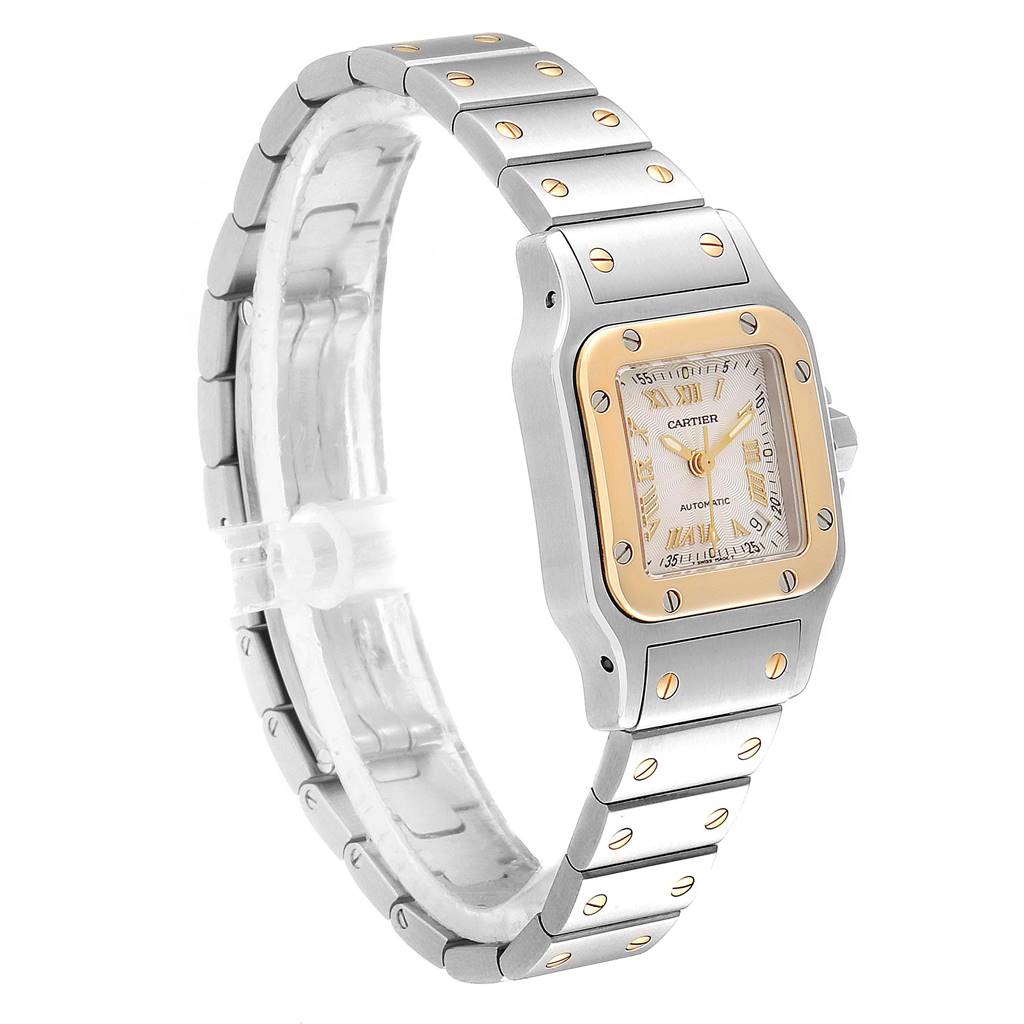 The Cartier Santos W20057C4 Women's Stainless Steel Silver Dial W20057C4 Women's Stainless Steel Silver Dial watch is shown from a three-quarter angle, displaying the face, bezel, and part of the bracelet.