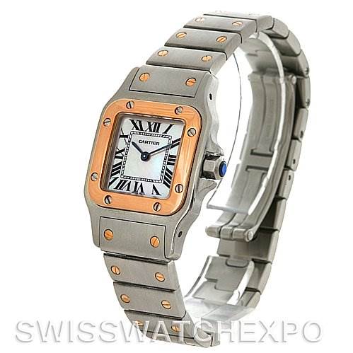 The image shows the Cartier Santos W20012C4 Women's Stainless Steel Mother of Pearl Dial W20012C4 Women's Stainless Steel Mother of Pearl Dial watch at a three-quarter angle, highlighting the face, bezel, and metal bracelet.