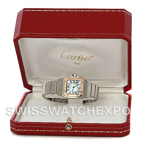 The image shows a Cartier Santos W20012C4 Women's Stainless Steel Mother of Pearl Dial W20012C4 Women's Stainless Steel Mother of Pearl Dial watch displayed at a front angle inside a red Cartier box with a visible metal bracelet and square dial.