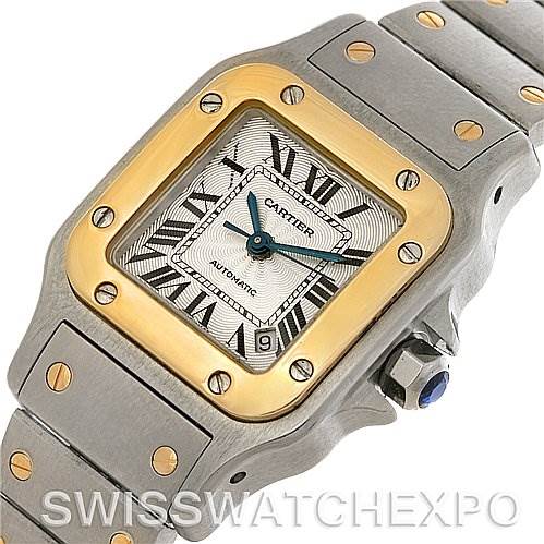 This image shows a close-up view of the face and part of the strap of the Cartier Santos Women's Stainless Steel Silver Dial Women's Stainless Steel Silver Dial watch.