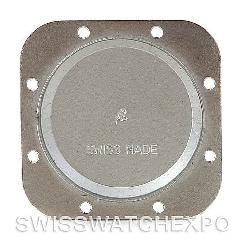 This image shows the back case plate of a Cartier Santos Women's Stainless Steel Silver Dial Women's Stainless Steel Silver Dial watch lying flat.