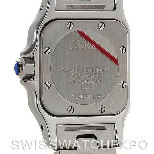 The image shows the back case and part of the bracelet of a Cartier Santos W20012C4 Women
s Stainless Steel Silver Dial W20012C4 Women
s Stainless Steel Silver Dial watch, highlighting the case screws, serial number, and water resistance information.