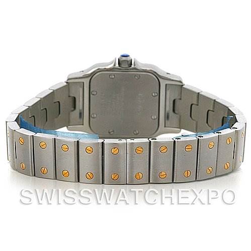 The image shows the backside and stainless steel band of a Cartier Santos W20012C4 Women
s Stainless Steel Silver Dial W20012C4 Women
s Stainless Steel Silver Dial watch, highlighting its distinctive screw accents.